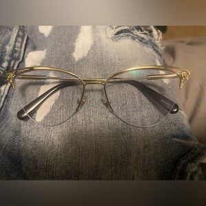 Gold frame Versace glasses